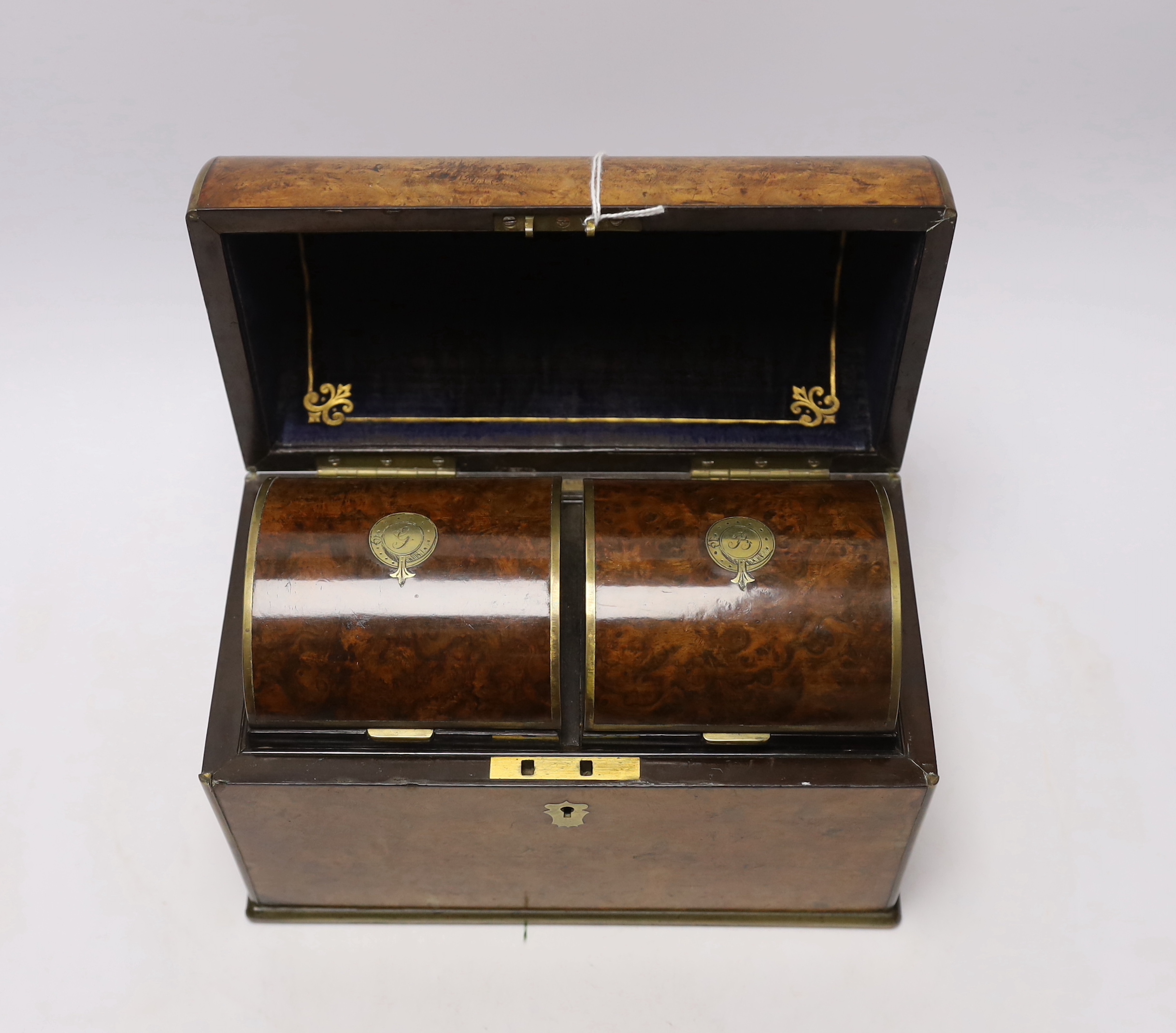 A Victorian burr walnut brass inlaid domed topped tea caddy with domed top interior and a brass inlaid rosewood tea caddy, largest 25cm wide